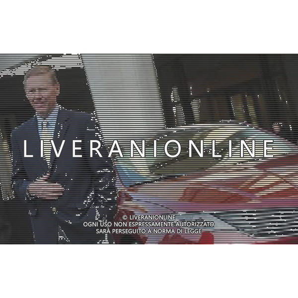 NEW YORK, NY - DECEMBER 03: Ford Motor Company President and CEO Alan Mulally stands beside a new Lincoln Motor Company MKZ sedan at a media launch in front of Avery Fisher Hall, Lincoln Center Plaza on December 3, 2012 in New York City. Ford is renaming its Lincoln division as the Lincoln Motor Co., as it looks to revive the luxury brand. The MKZ will arrive at dealerships later this month and will start at $35,925. The MKZ is the first of seven new Lincoln\'s that will go on sale by 2015. /AGENZIA ALDO LIVERANI SAS/ITALY ONLY - EDITORIAL USE ONLY