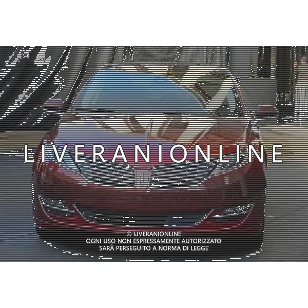 NEW YORK, NY - DECEMBER 03: The new Lincoln Motor Company MKZ sedan in front of Avery Fisher Hall, Lincoln Center Plaza on December 3, 2012 in New York City. Ford is renaming its Lincoln division as the Lincoln Motor Co., as it looks to revive the luxury brand. The MKZ will arrive at dealerships later this month and will start at $35,925. The MKZ is the first of seven new Lincoln\'s that will go on sale by 2015. /AGENZIA ALDO LIVERANI SAS/ITALY ONLY - EDITORIAL USE ONLY