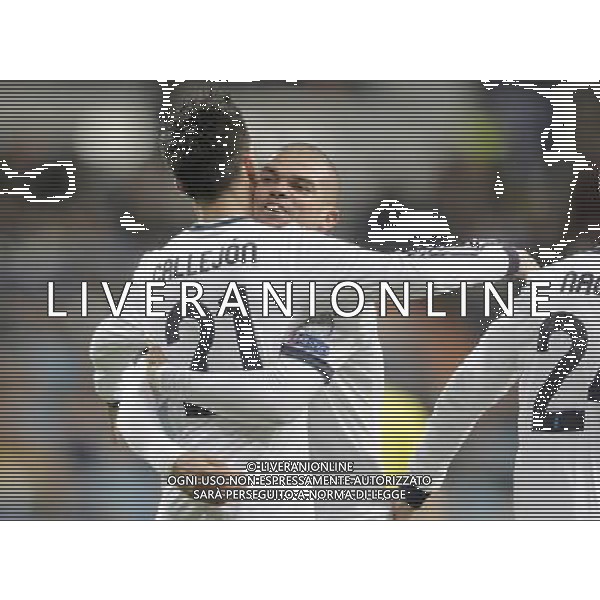 Real Madrid\'s Jose Callejon celebrates with Pepe during Champions League Match. December 04, 2012. Photo: Alvaro / ALFAQUI AG ALDO LIVERANI S A S ONLY ITALY