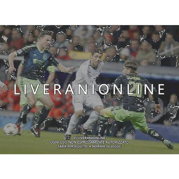 Real Madrid\'s Cristiano Ronaldo AFC Ajax\'s Lasse Schone during Champions League Match. December 04, 2012. Photo: Alvaro / ALFAQUI AG ALDO LIVERANI S A S ONLY ITALY
