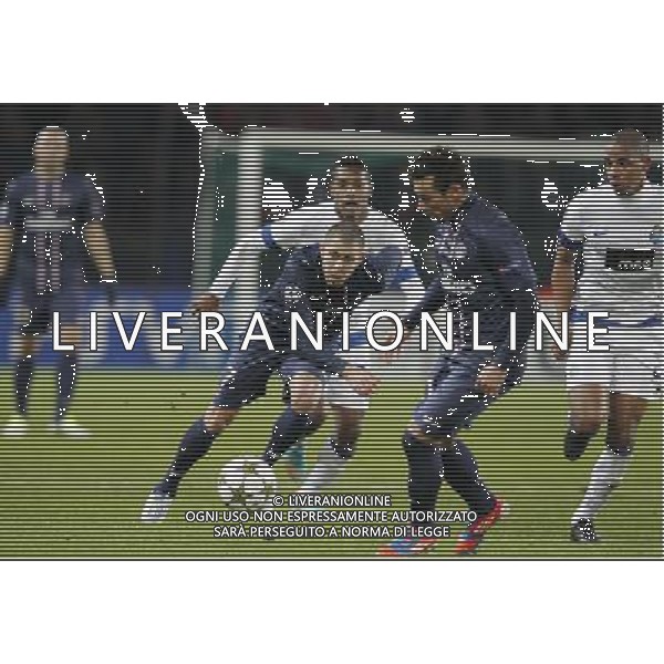 ©PHOTOPQR/LE PARISIEN/F DUGIT ; PARIS 04/12/2012 PSG - PORTO COMPTANT POUR LA LIGUE DES CHAMPIONS AU PARC DES PRINCES A PARIS (XVIe), LE 4 DECEMBRE 2012. PHOTO : Menez et Lavezzi (PSG) PSG vs Porto / champions league on dec 4th 2012