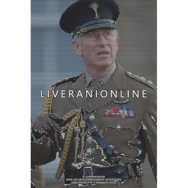 HRH The Prince of Wales, Colonel, 1st Battalion Welsh Guards, welcomes home the Battalion, and presents Operational Service Medals to those who have recently returned from Afghanistan following a 6 month deployment, Cavalry Barracks, Hounslow, England. 6-12-2012 ©photoshot/AGENZIA ALDO LIVERANI SAS - ITALY ONLY - REALI INGLESI: Il Principe Carlo in divisa da colonnello accoglie il 1mo battaglione delle Guardie gallesi appena tornato dall\'Afghanistan dopo 6 mesi di distribuzione, nella Caserma di Cavalleria, Hounslow, in Inghilterra 06/12/2012