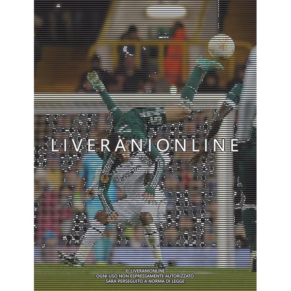 Jermain Defoe is challenged by Kostas Triantafyllopoulos Tottenham Hotspur 2012/13 Tottenham Hotspur V Panathinaikos (3-1) 06/12/12 UEFA Europa League Photo: Robin Parker Fotosports International AG ALDO LIVERANI S A S ONLY ITALY