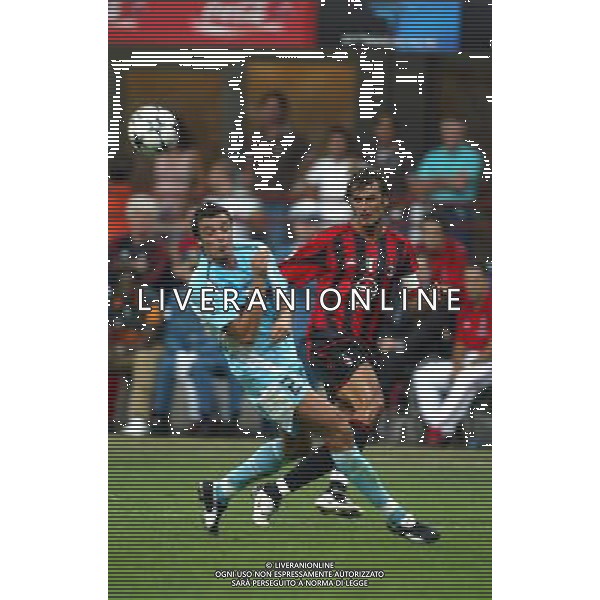 Italian Super Cup 2004 AC Milan vs Lazio Meazza Stadium-Milan 21 August 2004 photo (c) Enrico Calderoni (n¡ 391)-Aflo Sport Agency Maldini (Milan)-Oddo (Lazio) Agenzia Aldo Liverani