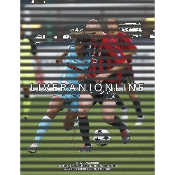 Italian Super Cup 2004 AC Milan vs Lazio Meazza Stadium-Milan 21 August 2004 photo (c) Enrico Calderoni (n¡ 391)-Aflo Sport Agency Muzzi (Lazio)-Stam (Milan) Agenzia Aldo Liverani