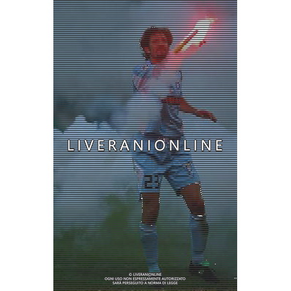 Italian Super Cup 2004 AC Milan vs Lazio Meazza Stadium-Milan 21 August 2004 photo (c) Enrico Calderoni (n¡ 391)-Aflo Sport Agency Negro (lazio) cleaning the field from a firework Agenzia Aldo Liverani