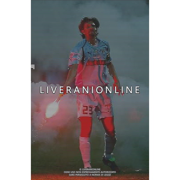 Italian Super Cup 2004 AC Milan vs Lazio Meazza Stadium-Milan 21 August 2004 photo (c) Enrico Calderoni (n¡ 391)-Aflo Sport Agency Negro (lazio) cleaning the field from a firework Agenzia Aldo Liverani