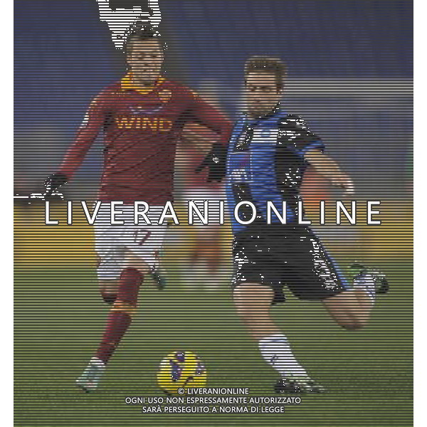 Roma - 11/12/2012 - Stadio Olimpico - Ottavi di finale TIM CUP 2012/2013 - Roma vs Atalanta - nella foto: Nicolas Lopez e Stafano Lucchini Â© Fabrizio Corradetti - Ag. Aldo Liverani sas