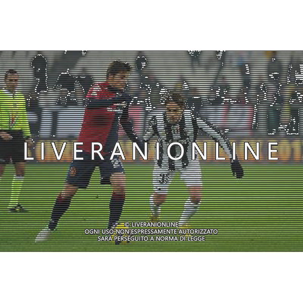 Coppa Italia TIM - Ottavi di Finale Torino 12-12-2012 Juventus - Cagliari nella foto: Daniele Dessena (Cagliari) a SX e Alessandro Matri (Juventus) foto Roberto Garavaglia - ag. Aldo Liverani sas