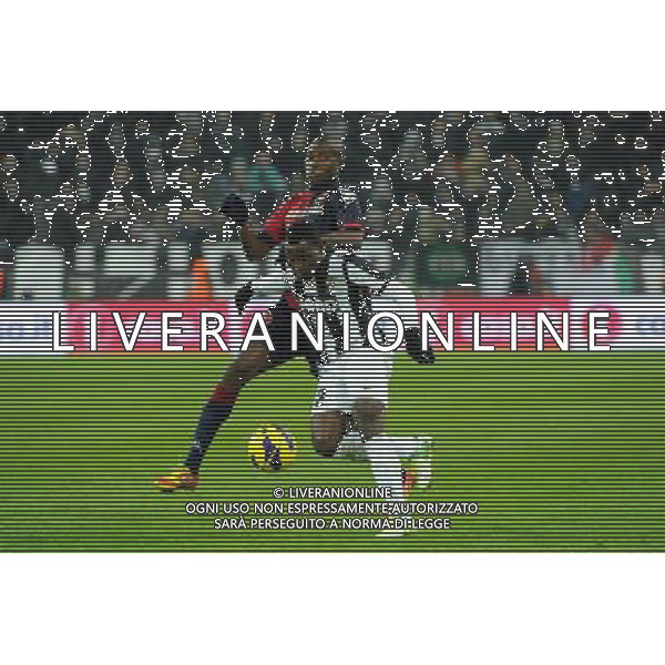 Coppa Italia TIM - Ottavi di Finale Torino 12-12-2012 Juventus - Cagliari nella foto: Kwadwo Asamoah (Juventus) e dietro Victor Ibarbo (Cagliari) foto Roberto Garavaglia - ag. Aldo Liverani sas
