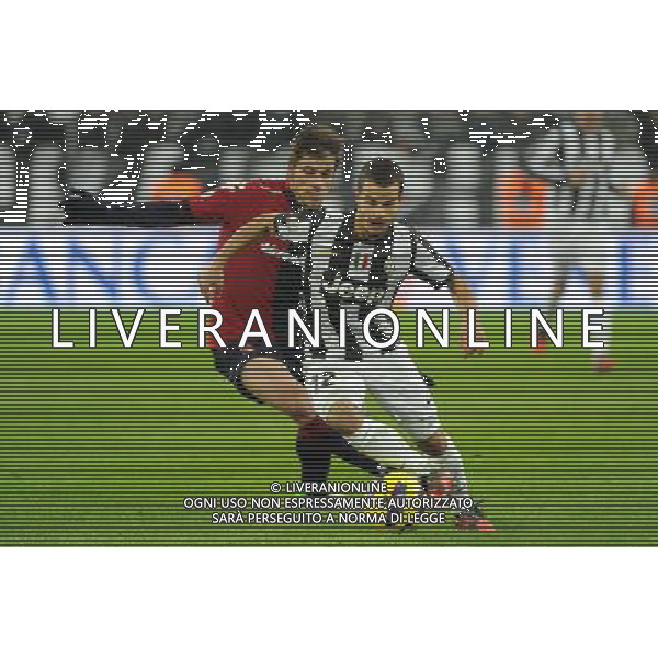 Coppa Italia TIM - Ottavi di Finale Torino 12-12-2012 Juventus - Cagliari nella foto: Sebastian Giovinco (Juventus) e dietro Daniele Dessena (Cagliari) foto Roberto Garavaglia - ag. Aldo Liverani sas