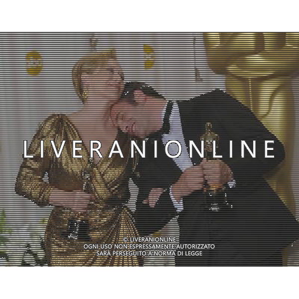 PICTURES OF THE YEAR 2012 FOR INTERNATIONAL NEWS (121227) -- BEIJING, Dec. 27, 2012 () -- Jean Dujardin (R), Best Actor In A Leading Role winner for \'The Artist\' and Meryl Streep (L), Best Actress In A Leading Role winner for \'The Iron Lady\', pose backstage at the 84th Annual Academy Awards in Hollywood, California, the United States, Feb. 26, 2012. (/Yang Lei) (zjl) ©Photoshot/AGENZIA ALDO LIVERANI SAS-ITALY ONLY - EDITORIAL USE ONLY