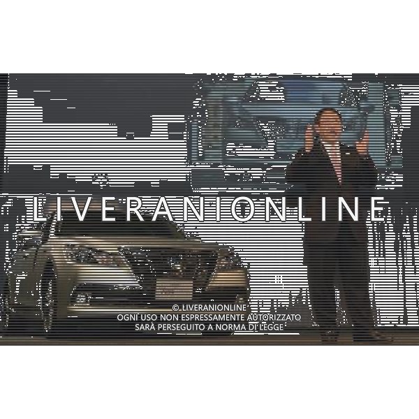 (121225) -- TOKYO, Dec. 25, 2012 () -- President and Representatives Director of Toyota Motor Corporation Akio Toyoda presents the \'Royal\' series of the 14th generation Crown during a launch event in Tokyo, capital of Japan, on Dec. 25, 2012. Toyota Motor Corp. on Tuesday launched a completely remodeled Crown luxury sedan featuring an all-new design and improved safety functions. (/Ma Ping) (syq) AG ALDO LIVERANI S A S ONLY ITALY