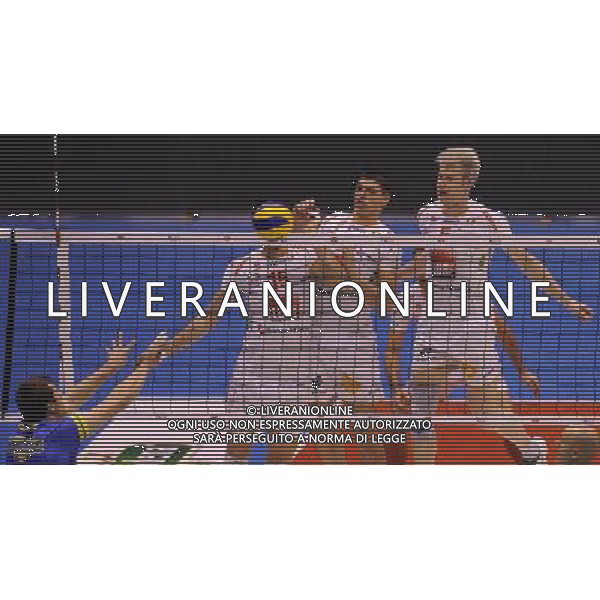 Del Monte Coppa Italia Serie A1 di Volley 2012 Semifinale 2 Milano - 29.12.2012 Lube Banca Macerata-Casa Modena Nella Foto:muro errato di ivan zaytsev sasa starovic marko podrascanin /Ph.Vitez-Ag. Aldo Liverani