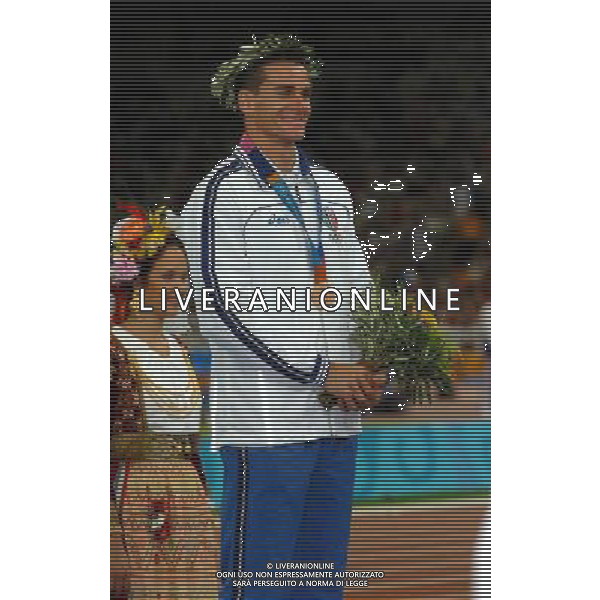 OLIMPIADI ATENE 2004 NELLA FOTO: GIBILISCO GIUSEPPE RICEVE LA MEDAGLIA DI BRONZO PH: LUZZANI/LIVERANI