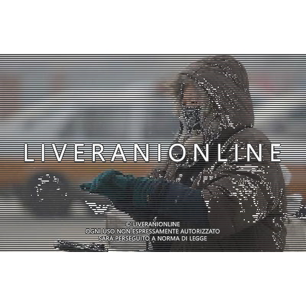 (130101) -- CHANGCHUN, Jan. 1, 2013 () -- A citizen rides in snow on a street in Changchun, capital of northeast China\'s Jilin Province, Jan. 1, 2013. Many parts of Jilin saw the first snow in this year on Tuesday. (/Lin Hong) (zz) ©Photoshot/AGENZIA ALDO LIVERANI SAS-ITALY ONLY - EDITORIAL USE ONLY