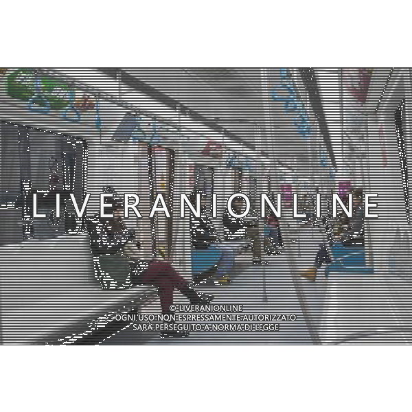 (121230) -- BEIJING, Dec. 30, 2012 () -- Passengers take the newly-opened Phase II of Subway Line 10 in Beijing, capital of China, Dec. 30, 2012. Beijing put four new subway lines into operation on Sunday, increasing its daily passenger capacity by about 1.5 million. The new lines have brought the number of subway lines in Beijing to 16, raising the capital city\'s total subway transport capacity to over 9 million passengers per day, said the Beijing Metro Company. (/Zhao Bing) (lmm) ©Photoshot/AGENZIA ALDO LIVERANI SAS-ITALY ONLY - EDITORIAL USE ONLY