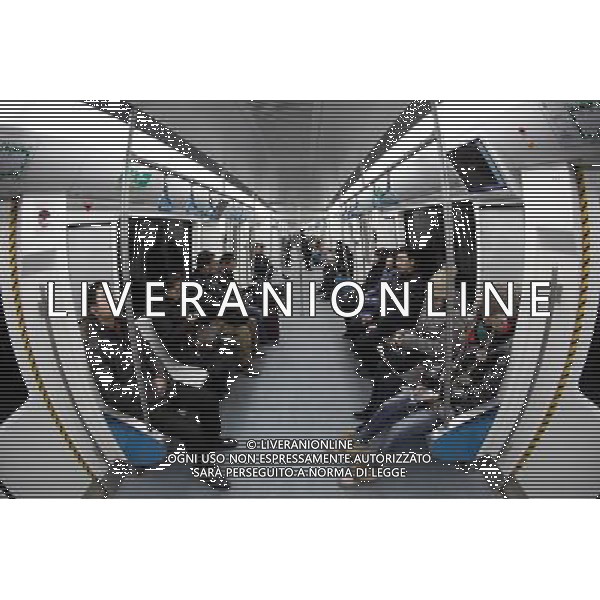 (121230) -- BEIJING, Dec. 30, 2012 () -- Passengers take the newly-opened Phase II of Subway Line 10 in Beijing, capital of China, Dec. 30, 2012. Beijing put four new subway lines into operation on Sunday, increasing its daily passenger capacity by about 1.5 million. The new lines have brought the number of subway lines in Beijing to 16, raising the capital city\'s total subway transport capacity to over 9 million passengers per day, said the Beijing Metro Company. (/Yang Le) (lmm) ©Photoshot/AGENZIA ALDO LIVERANI SAS-ITALY ONLY - EDITORIAL USE ONLY