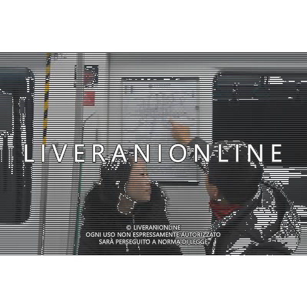 (121230) -- BEIJING, Dec. 30, 2012 () -- Passengers look at the subway map on a train of the northern section of subway line 9 in Beijing, capital of China, Dec. 30, 2012. Beijing put four subway lines into operation on Sunday, part of the city\'s efforts to expand rail transit to ease severe traffic congestion. The new lines bring the number of subway lines in Beijing to 16, with a total length of 442 kilometers, according to authorities. (/Zhang Cheng) (zc) ©Photoshot/AGENZIA ALDO LIVERANI SAS-ITALY ONLY - EDITORIAL USE ONLY