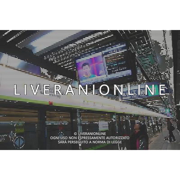 (121230) -- BEIJING, Dec. 30, 2012 () -- Passengers wait for the first train on a platform at the National Library Station of the northern section of subway line 9 in Beijing, capital of China, Dec. 30, 2012. Beijing put four subway lines into operation on Sunday, part of the city\'s efforts to expand rail transit to ease severe traffic congestion. The new lines bring the number of subway lines in Beijing to 16, with a total length of 442 kilometers, according to authorities. (/Pan Siwei) (ry) ©Photoshot/AGENZIA ALDO LIVERANI SAS-ITALY ONLY - EDITORIAL USE ONLY