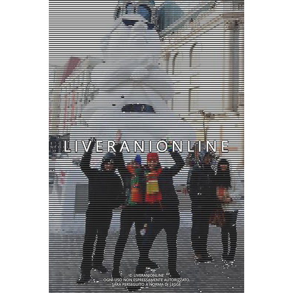 (130102) -- HARBIN, Jan. 2, 2013 () -- Tourists pose for photo in front of a snow sculpture of South Korean rapper Psy in Harbin, capital of northeast China\'s Heilongjiang Province, Jan. 2, 2013. Psy\'s music video of \'Gangnam Style,\' featuring the horse-riding dance, became a global sensation this year. (/Wang Jianwei) (mp) ©Photoshot-ITALY ONLY - EDITORIAL USE ONLY/AGENZIA ALDO LIVERANI SAS