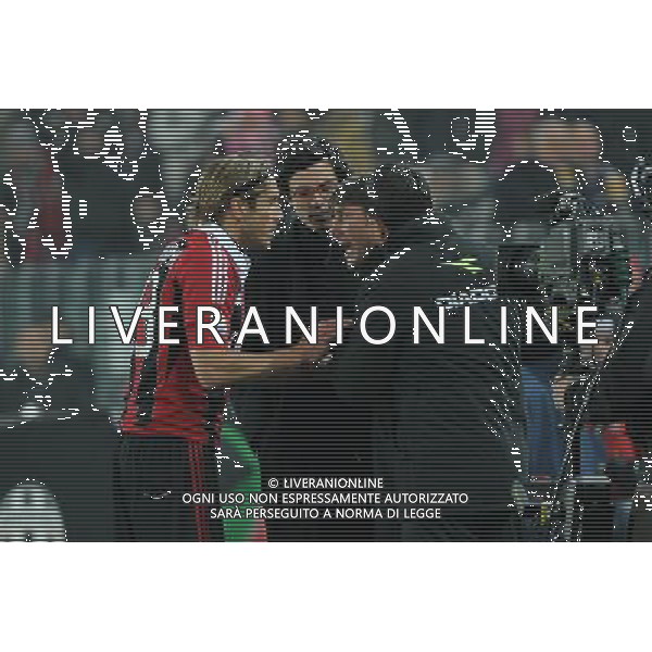 Coppa Italia TIM - Quarti di Finale Torino 9-01-2013 Juventus - Milan nella foto: tensione Conte e Ambrosini dopo un duro fallo di Mexes su Giovinco foto Roberto Garavaglia - ag. Aldo Liverani sas