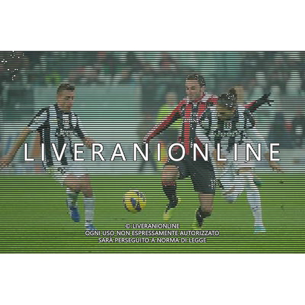 Coppa Italia TIM - Quarti di Finale Torino 9-01-2013 Juventus - Milan nella foto: Pazzini tra Giaccherini e Caceres foto Roberto Garavaglia - ag. Aldo Liverani sas