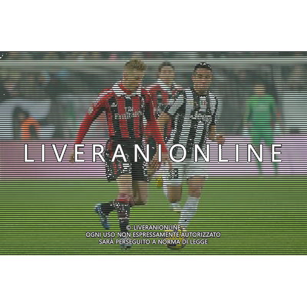Coppa Italia TIM - Quarti di Finale Torino 9-01-2013 Juventus - Milan nella foto: Ignazio Abate (Milan) a SX e Mauricio Isla (Juventus) foto Roberto Garavaglia - ag. Aldo Liverani sas