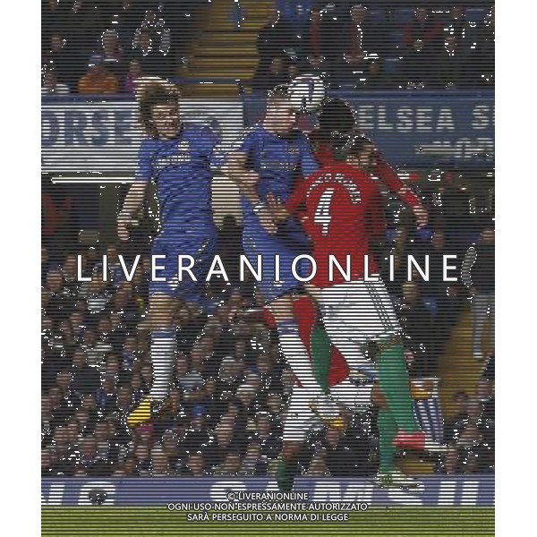 Chelsea\'s Gary Cahill heads at the goal Football - Football - Capital One Cup Semi-Final - Chelsea v Swansea City - Wednesday 9th January 2013 - Stamford Bridge - London © CameraSport - 43 Linden Ave. Countesthorpe. Leicester. England. LE8 5PG - Tel: +44 (0) 116 277 4147 - admin@camerasport.com - www.camerasport.com AG ALDO LIVERANI S A S ONLY ITALY