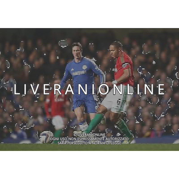 Swansea City\'s Ashley Williams and Chelsea\'s Fernando Torres in action during todays match Football - Football - Capital One Cup Semi-Final - Chelsea v Swansea City - Wednesday 9th January 2013 - Stamford Bridge - London © CameraSport - 43 Linden Ave. Countesthorpe. Leicester. England. LE8 5PG - Tel: +44 (0) 116 277 4147 - admin@camerasport.com - www.camerasport.com AG ALDO LIVERANI S A S ONLY ITALY