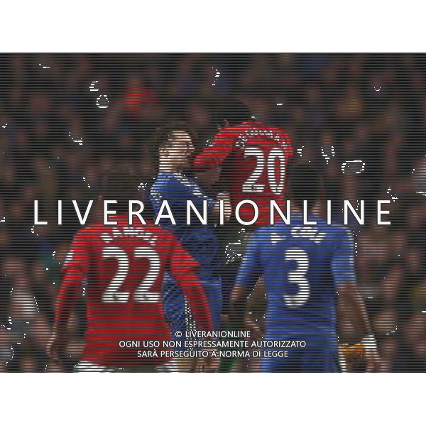 Chelsea\'s David Luiz receives an elbow from Swansea City\'s Jonathan de Guzman Football - Football - Capital One Cup Semi-Final - Chelsea v Swansea City - Wednesday 9th January 2013 - Stamford Bridge - London © CameraSport - 43 Linden Ave. Countesthorpe. Leicester. England. LE8 5PG - Tel: +44 (0) 116 277 4147 - admin@camerasport.com - www.camerasport.com AG ALDO LIVERANI S A S ONLY ITALY