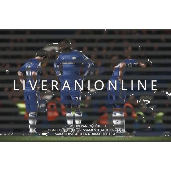 Chelsea\'s Demba Ba, Juan Mata and ,Frank Lampard reacts after conceding second goal Football - Football - Capital One Cup Semi-Final - Chelsea v Swansea City - Wednesday 9th January 2013 - Stamford Bridge - London © CameraSport - 43 Linden Ave. Countesthorpe. Leicester. England. LE8 5PG - Tel: +44 (0) 116 277 4147 - admin@camerasport.com - www.camerasport.com AG ALDO LIVERANI S A S ONLY ITALY