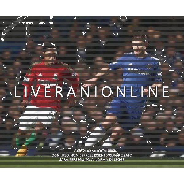Chelsea\'s Branislav Ivanovic and Swansea City\'s Jonathan de Guzman in action during todays match Football - Football - Capital One Cup Semi-Final - Chelsea v Swansea City - Wednesday 9th January 2013 - Stamford Bridge - London © CameraSport - 43 Linden Ave. Countesthorpe. Leicester. England. LE8 5PG - Tel: +44 (0) 116 277 4147 - admin@camerasport.com - www.camerasport.com AG ALDO LIVERANI S A S ONLY ITALY