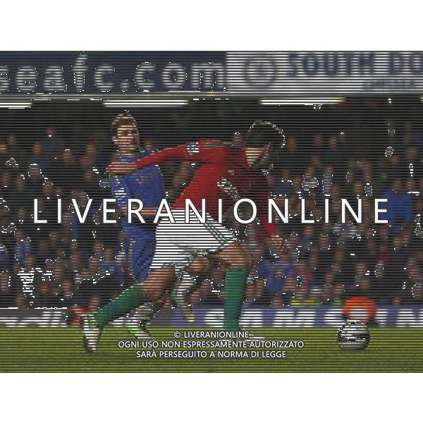 Swansea City\'s Danny Graham is about to score his side second goal after Chelsea\'s Branislav Ivanovic mistake Football - Football - Capital One Cup Semi-Final - Chelsea v Swansea City - Wednesday 9th January 2013 - Stamford Bridge - London © CameraSport - 43 Linden Ave. Countesthorpe. Leicester. England. LE8 5PG - Tel: +44 (0) 116 277 4147 - admin@camerasport.com - www.camerasport.com AG ALDO LIVERANI S A S ONLY ITALY