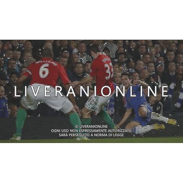 (130110) -- LONDON, Jan. 10, 2013 () -- Cesar Azpilicueta (R) of Chelsea competes during the English League Cup (Capital One Cup) semifinal first leg between Chelsea and Swansea at Stamford Bridge in London, Britain, on Jan. 9, 2013. Chelsea lost 0-2. (/Wang Lili) FOR EDITORIAL USE ONLY. NOT FOR SALE FOR MARKETING OR ADVERTISING CAMPAIGNS. NO USE WITH UNAUTHORIZED AUDIO, VIDEO, DATA, FIXTURE LISTS, CLUB/LEAGUE LOGOS OR \'LIVE\' SERVICES. ONLINE IN-MATCH USE LIMITED TO 45 IMAGES, NO VIDEO EMULATION. NO USE IN BETTING, GAMES OR SINGLE CLUB/LEAGUE/PLAYER PUBLICATIONS. AG ALDO LIVERANI S A S ONLY ITALY