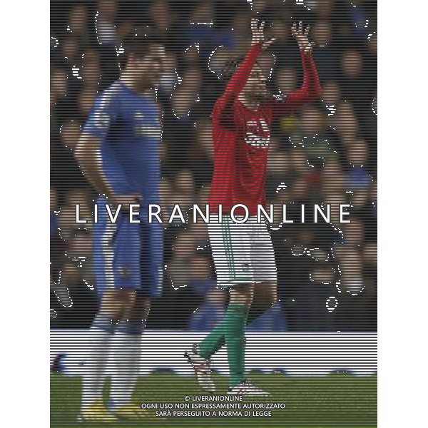 (130110) -- LONDON, Jan. 10, 2013 () -- Michu (R) of Swansea celebrates after scoring the team\'s first goal during the English League Cup (Capital One Cup) semifinal first leg between Chelsea and Swansea at Stamford Bridge in London, Britain, on Jan. 9, 2013. Chelsea lost 0-2. (/Wang Lili) FOR EDITORIAL USE ONLY. NOT FOR SALE FOR MARKETING OR ADVERTISING CAMPAIGNS. NO USE WITH UNAUTHORIZED AUDIO, VIDEO, DATA, FIXTURE LISTS, CLUB/LEAGUE LOGOS OR \'LIVE\' SERVICES. ONLINE IN-MATCH USE LIMITED TO 45 IMAGES, NO VIDEO EMULATION. NO USE IN BETTING, GAMES OR SINGLE CLUB/LEAGUE/PLAYER PUBLICATIONS. AG ALDO LIVERANI S A S ONLY ITALY