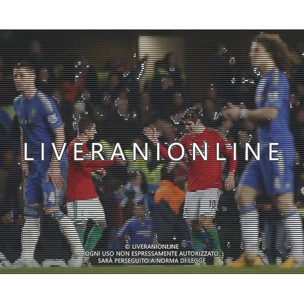 (130110) -- LONDON, Jan. 10, 2013 () -- Danny Graham(2nd R) of Swansea celebrates with a teammate after scoring the team\'s second goal during the English League Cup (Capital One Cup) semifinal first leg between Chelsea and Swansea at Stamford Bridge in London, Britain, on Jan. 9, 2013. Chelsea lost 0-2. (/Wang Lili) FOR EDITORIAL USE ONLY. NOT FOR SALE FOR MARKETING OR ADVERTISING CAMPAIGNS. NO USE WITH UNAUTHORIZED AUDIO, VIDEO, DATA, FIXTURE LISTS, CLUB/LEAGUE LOGOS OR \'LIVE\' SERVICES. ONLINE IN-MATCH USE LIMITED TO 45 IMAGES, NO VIDEO EMULATION. NO USE IN BETTING, GAMES OR SINGLE CLUB/LEAGUE/PLAYER PUBLICATIONS. AG ALDO LIVERANI S A S ONLY ITALY