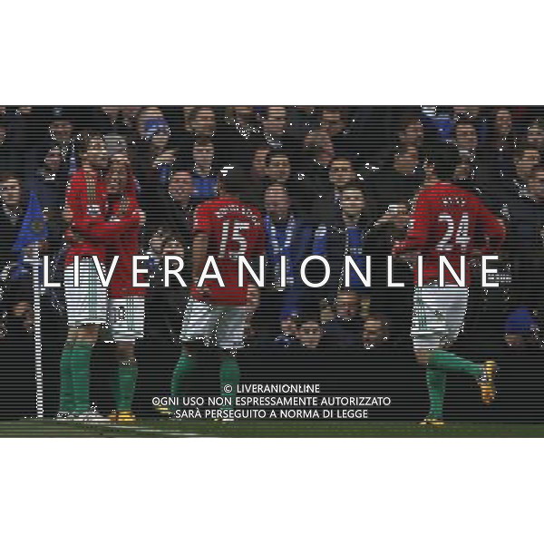 (130110) -- LONDON, Jan. 10, 2013 () -- Michu (1st L) of Swansea celebrates with teammates Jonathan de Guzman (2nd L), Wayne Routledge (2nd R) and Ki Sung-Yeung after scoring the team\'s second goal during the English League Cup (Capital One Cup) semifinal first leg between Chelsea and Swansea at Stamford Bridge in London, Britain, on Jan. 9, 2013. Chelsea lost 0-2. (/Wang Lili) FOR EDITORIAL USE ONLY. NOT FOR SALE FOR MARKETING OR ADVERTISING CAMPAIGNS. NO USE WITH UNAUTHORIZED AUDIO, VIDEO, DATA, FIXTURE LISTS, CLUB/LEAGUE LOGOS OR \'LIVE\' SERVICES. ONLINE IN-MATCH USE LIMITED TO 45 IMAGES, NO VIDEO EMULATION. NO USE IN BETTING, GAMES OR SINGLE CLUB/LEAGUE/PLAYER PUBLICATIONS. AG ALDO LIVERANI S A S ONLY ITALY