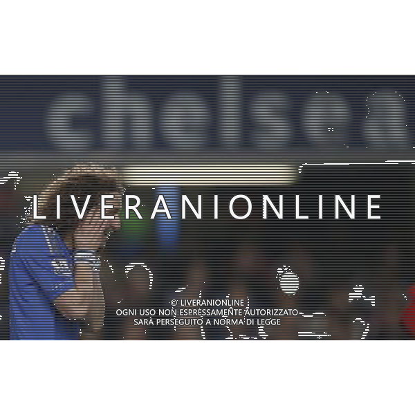 (130110) -- LONDON, Jan. 10, 2013 () -- David Luiz of Chelsea reacts after missing a goal during the English League Cup (Capital One Cup) semifinal first leg between Chelsea and Swansea at Stamford Bridge in London, Britain, on Jan. 9, 2013. Chelsea lost 0-2. (/Wang Lili) FOR EDITORIAL USE ONLY. NOT FOR SALE FOR MARKETING OR ADVERTISING CAMPAIGNS. NO USE WITH UNAUTHORIZED AUDIO, VIDEO, DATA, FIXTURE LISTS, CLUB/LEAGUE LOGOS OR \'LIVE\' SERVICES. ONLINE IN-MATCH USE LIMITED TO 45 IMAGES, NO VIDEO EMULATION. NO USE IN BETTING, GAMES OR SINGLE CLUB/LEAGUE/PLAYER PUBLICATIONS. AG ALDO LIVERANI S A S ONLY ITALY