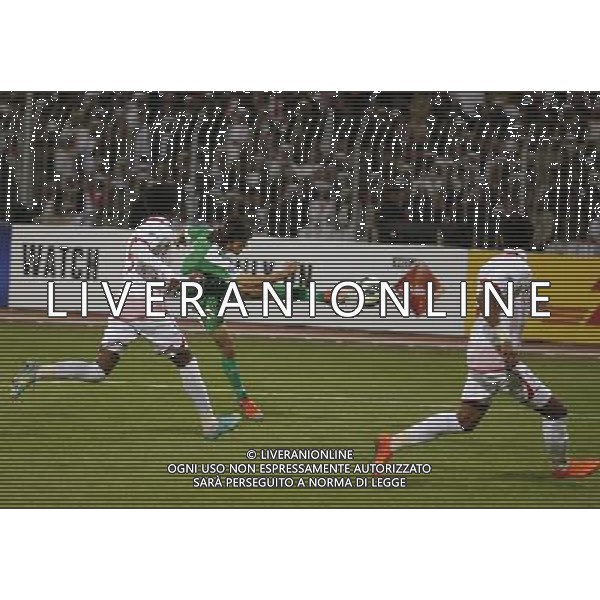 (130119) -- AR RIFA\' , Jan. 19, 2013 () -- Iraq\'s Humam Tariq (C) shoots during the Gulf Cup final match against United Arab Emirates at Bahrin National Stadium in Ar Rifa\', Bahrain, Jan. 18, 2013. UAE won 2-1 to claim the title. (/Ali Mahmood) ©photoshot/AGENZIA ALDO LIVERANI SAS - ITALY ONLY - EMIRATI ARABI UNITI VS IRAQ partita finale della Coppa del golfo allo Stadio Nazionale di Ar Rifa\', Bahrain, 18 gennaio 2013.