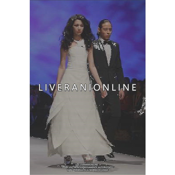 (130116) -- HONG KONG, Jan. 16, 2013 () -- Two models show the creation of fashion designer Pascal Piveteau during the Hong Kong Fashion Week for Fall/Winter and World Boutique in south China\'s Hong Kong, Jan. 16, 2013. The creations of 10 international designers were showed during the event on Wednesday. (/Jin Yi) (zkr) ©Photoshot/AGENZIA ALDO LIVERANI SAS-ITALY ONLY - EDITORIAL USE ONLY
