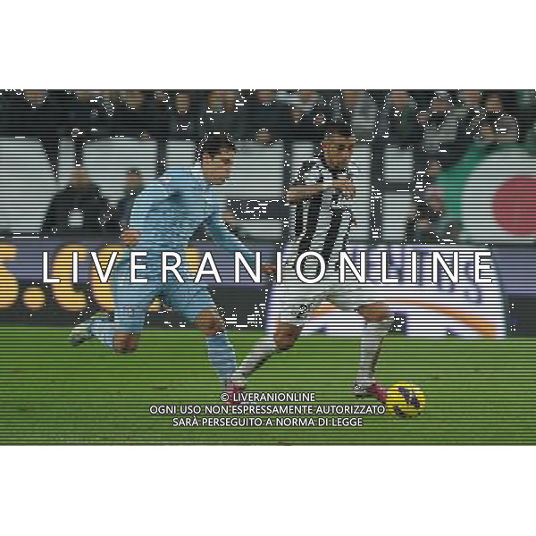 Coppa Italia TIM - Semifinale gara di andata Torino 22-01-2013 Juventus - Lazio nella foto: Viana Lima Hernanes (Lazio) a SX e Arturo Vidal (Juventus) foto Roberto Garavaglia - ag. Aldo Liverani sas