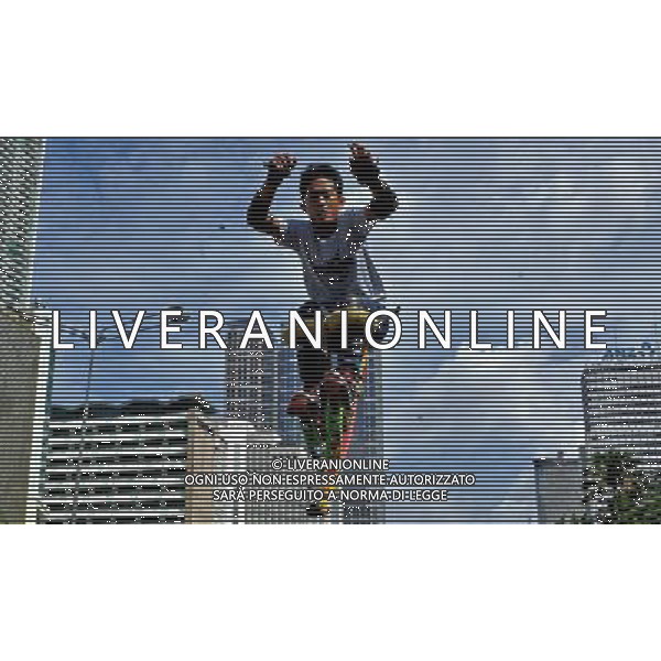 (130127) -- JAKARTA, Jan. 27, 2013 () -- A man performs a jump with jumping stilts during car-free day in Jakarta, Indonesia, Jan. 27, 2013. (/Agung Kuncahya B.) ©Photoshot/AGENZIA ALDO LIVERANI SAS-ITALY ONLY - EDITORIAL USE ONLY