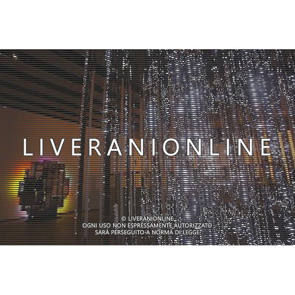 American artist Leo Villareal\'s installation, Cylinder II (2012) (Right), and Scottish artist David Batchelor\'s Magic Hour (2004/2007) (Left), during the press preview for Light Show at the Hayward Gallery on the Southbank in London. Photo date: Tuesday January 29, 2013. Their works are two of 25 that make up the exhibition, which opens to the public tomorrow and runs until April 28. Light Show explores how we experience and psychologically respond to illumination and colour and features work by 22 artists from the 1960s to the present day. Photo credit: Johnny Green ©Photoshot/AGENZIA ALDO LIVERANI SAS-ITALY ONLY - EDITORIAL USE ONLY
