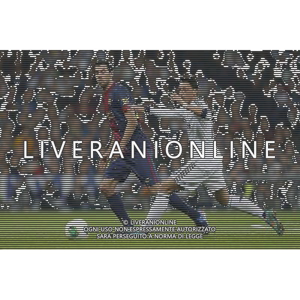 Real Madrid\'s Mesut Ozil and FC Barcelona\'s Sergio Busquets during spanish Kings Cup match on January 30th 2013. Photo: Cid-Fuentes Cebolla / ALFAQUI AG ALDO LIVERANI S A S ONLY ITALY