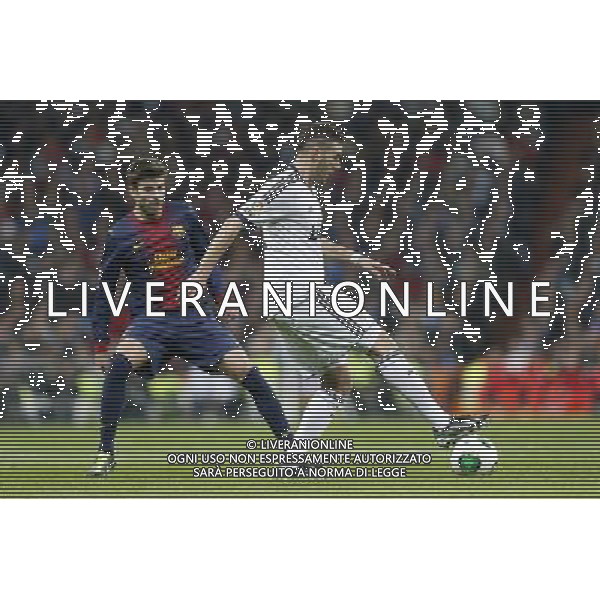 Real Madrid\'s Karim Benzema and FC Barcelona\'s Gerard Pique during spanish Kings Cup match on January 30th 2013. Photo: Cid-Fuentes Cebolla / ALFAQUI AG ALDO LIVERANI S A S ONLY ITALY