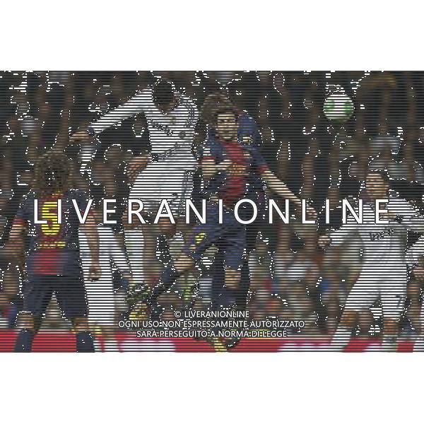 Real Madrid\'s Raphael Varane (goal) and FC Barcelona\'s Cesc Fabregas and Gerard Pique during spanish Kings Cup match on January 30th 2013. Photo: Cid-Fuentes Cebolla / ALFAQUI AG ALDO LIVERANI S A S ONLY ITALY