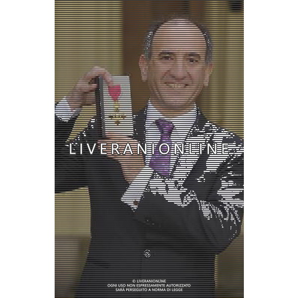 Mandatory Credit: Photo by Jonathan Hordle / Rex Features (2110183g) Mr.Armando Iannucci, awarded an OBE for services to Broadcasting. Investitures at Buckingham Palace,London,Britain. - 01 Feb 2013 ©photoshot/AGENZIA ALDO LIVERANI SAS - ITALY ONLY - EDITORIAL USE ONLY