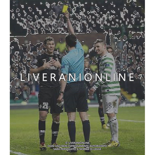 12/02/13 UEFA CHAMPIONS LEAGUE CELTIC v JUVENTUS CELTIC PARK - GLASGOW Celtic striker Gary Hooper (right) and Stephan Lichtsteiner are booked ©/AGENZIA ALDO LIVERANI SAS - ITALY ONLY - EDITORIAL USE ONLY
