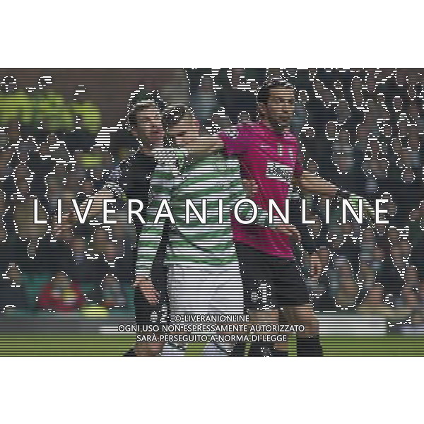 12/02/13 UEFA CHAMPIONS LEAGUE CELTIC v JUVENTUS CELTIC PARK - GLASGOW Celtic striker Gary Hooper (centre) receives some rough treatment from Juventus pair Gianluigi Buffon (right) and Stephan Lichtsteiner ©/AGENZIA ALDO LIVERANI SAS - ITALY ONLY - EDITORIAL USE ONLY